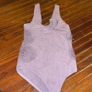 Soft purple bodysuit cut our sides
